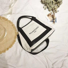 Cargar imagen en el visor de la galería, Canvas  Logo Print Bag Rucksack
