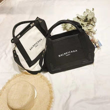 Cargar imagen en el visor de la galería, Canvas  Logo Print Bag Rucksack
